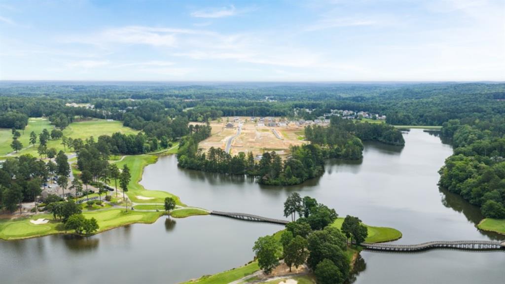 904 Sundown Point Villa Rica, GA 30180 - Photo 53 of 83 an aerial view of lake and residential houses with outdoor space