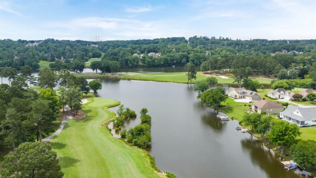 904 Sundown Point Villa Rica, GA 30180 - Photo 62 of 83 a view of a lake with a mountain in the background