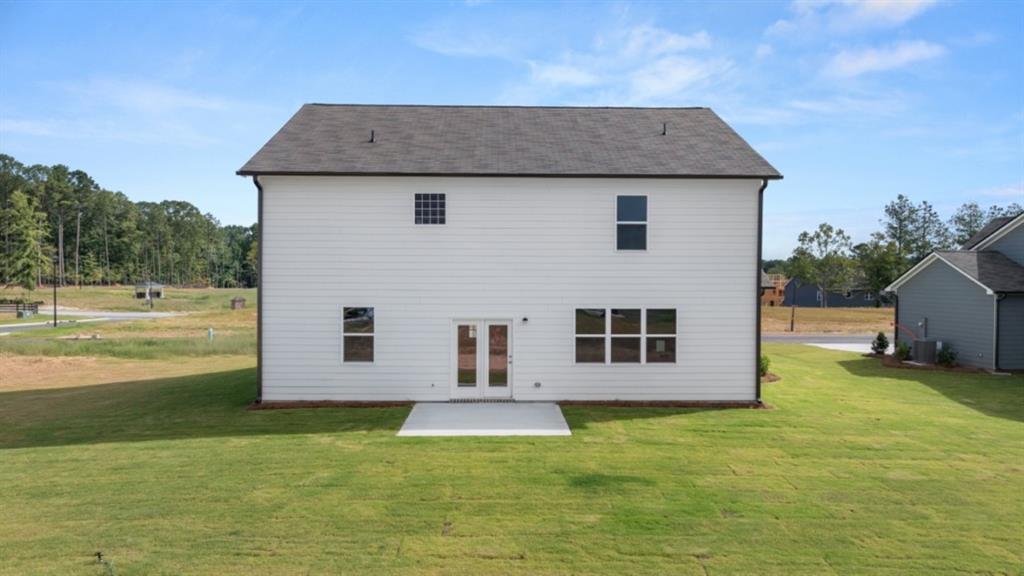 904 Sundown Point Villa Rica, GA 30180 - Photo 7 of 83 a view of a house with a backyard