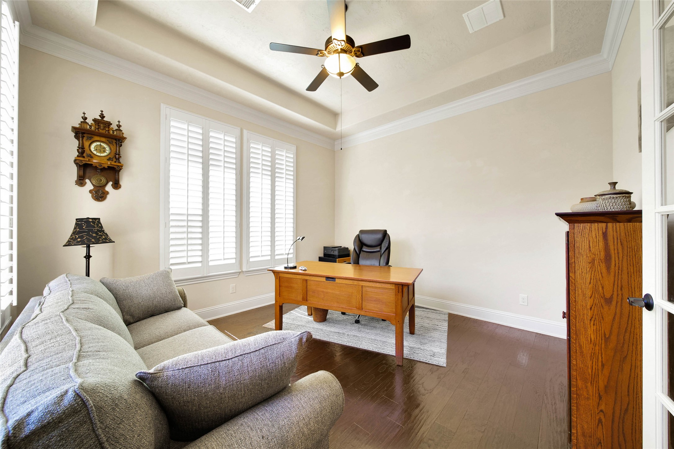 3234 Explorer Way Conroe, TX 77301 - Photo 12 of 46 Dedicated home office or fourth bedroom with hardwood floors, crown molding, and abundant natural light.