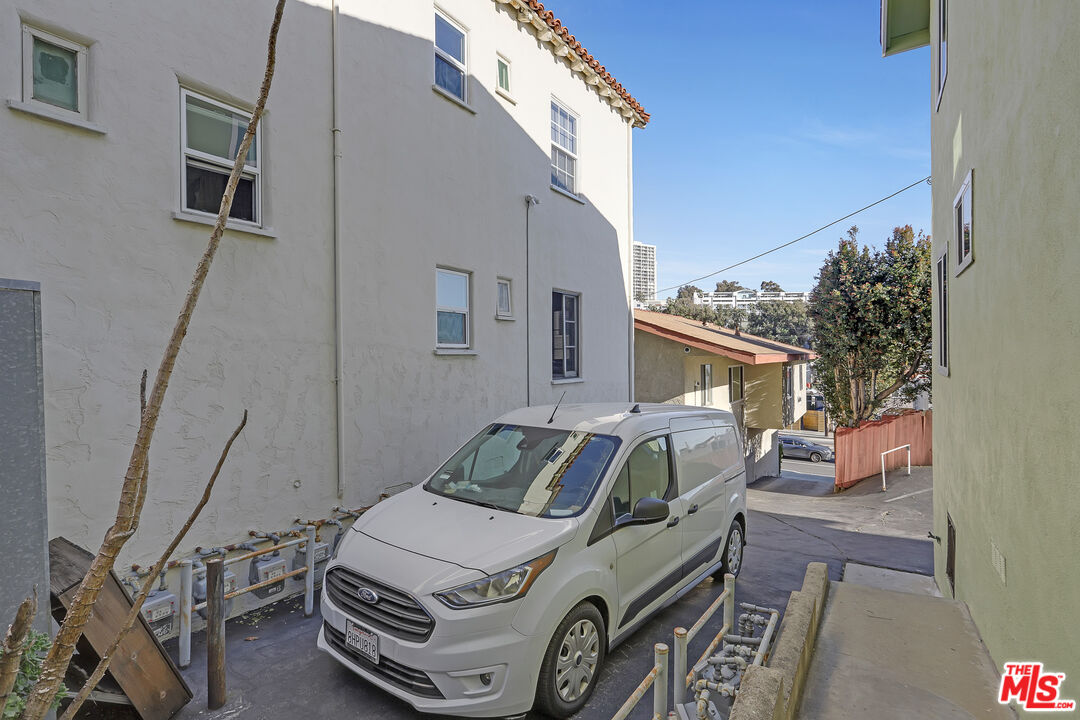 153 West Channel Road Santa Monica, CA 90402 - Photo 66 of 74 a car parked in front of a house