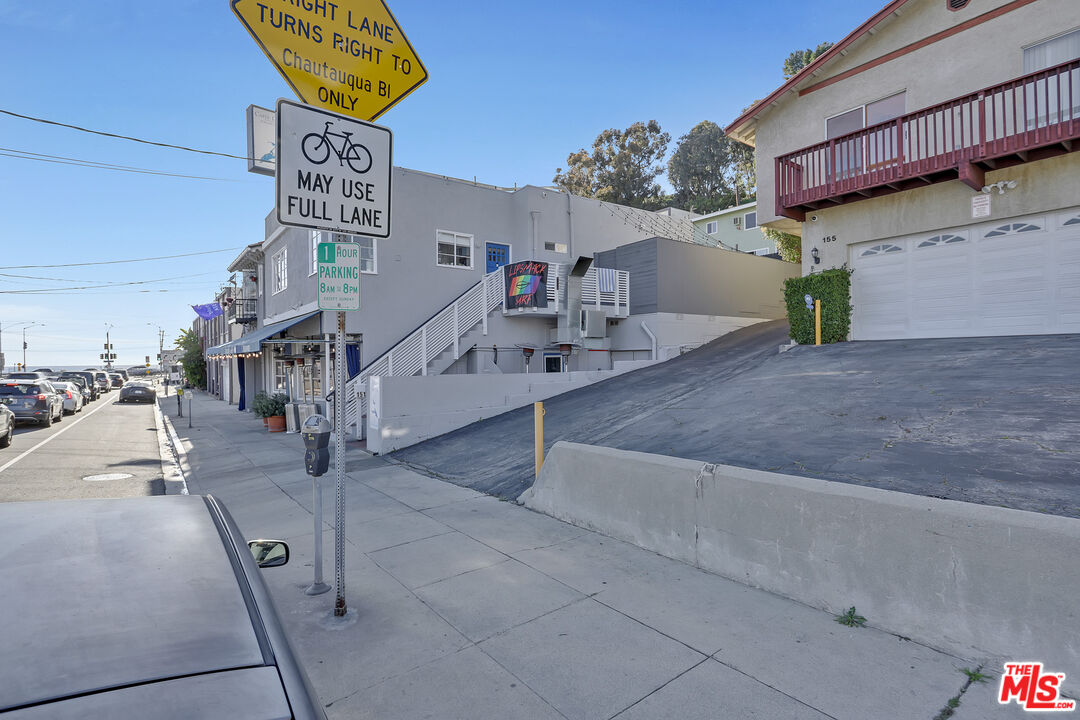 153 West Channel Road Santa Monica, CA 90402 - Photo 71 of 74 a view of a street with seating area