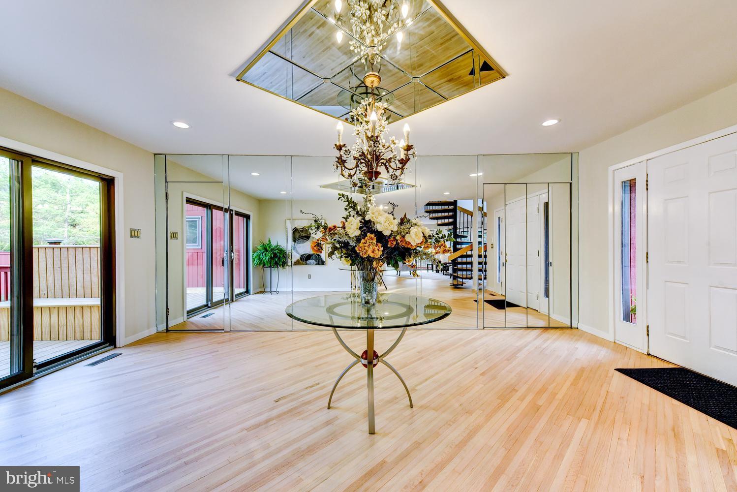 15 Hawk Drive Princeton Junction, NJ 08550 - Photo 16 of 95 a view of a dining room with furniture wooden floor and chandelier