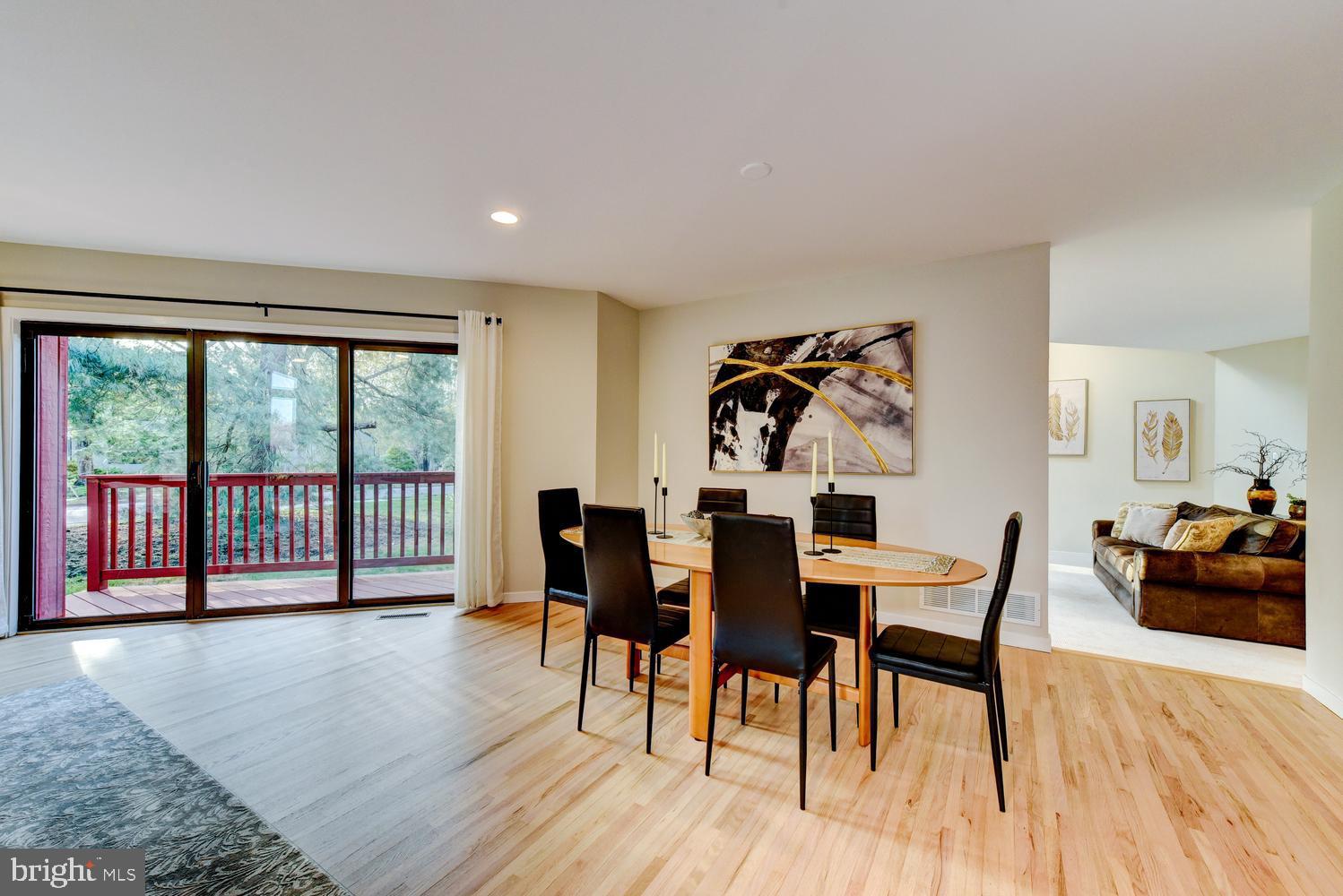 15 Hawk Drive Princeton Junction, NJ 08550 - Photo 25 of 95 a view of a dining room with furniture and wooden floor
