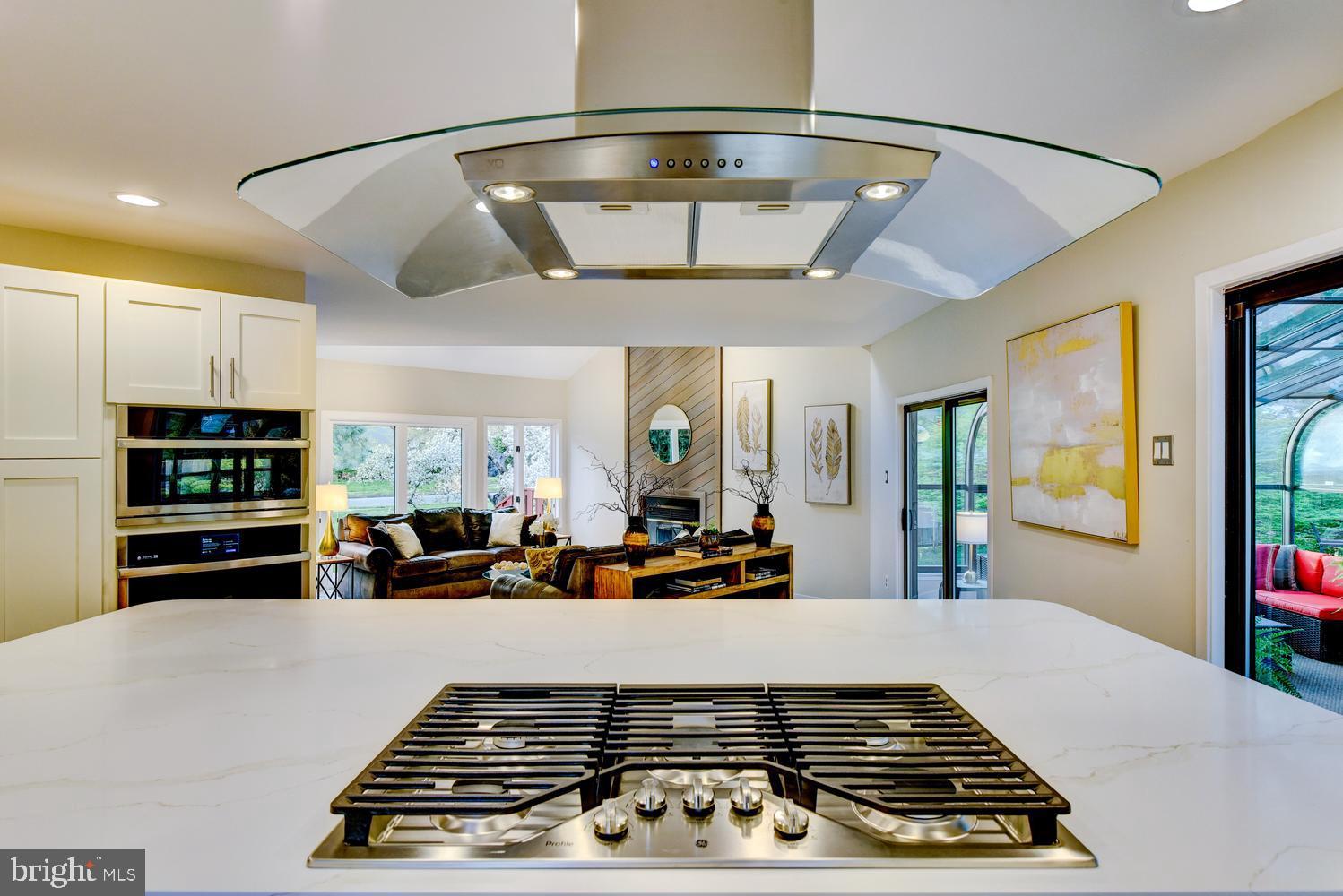 15 Hawk Drive Princeton Junction, NJ 08550 - Photo 36 of 95 a kitchen with stainless steel appliances a stove a refrigerator and cabinets