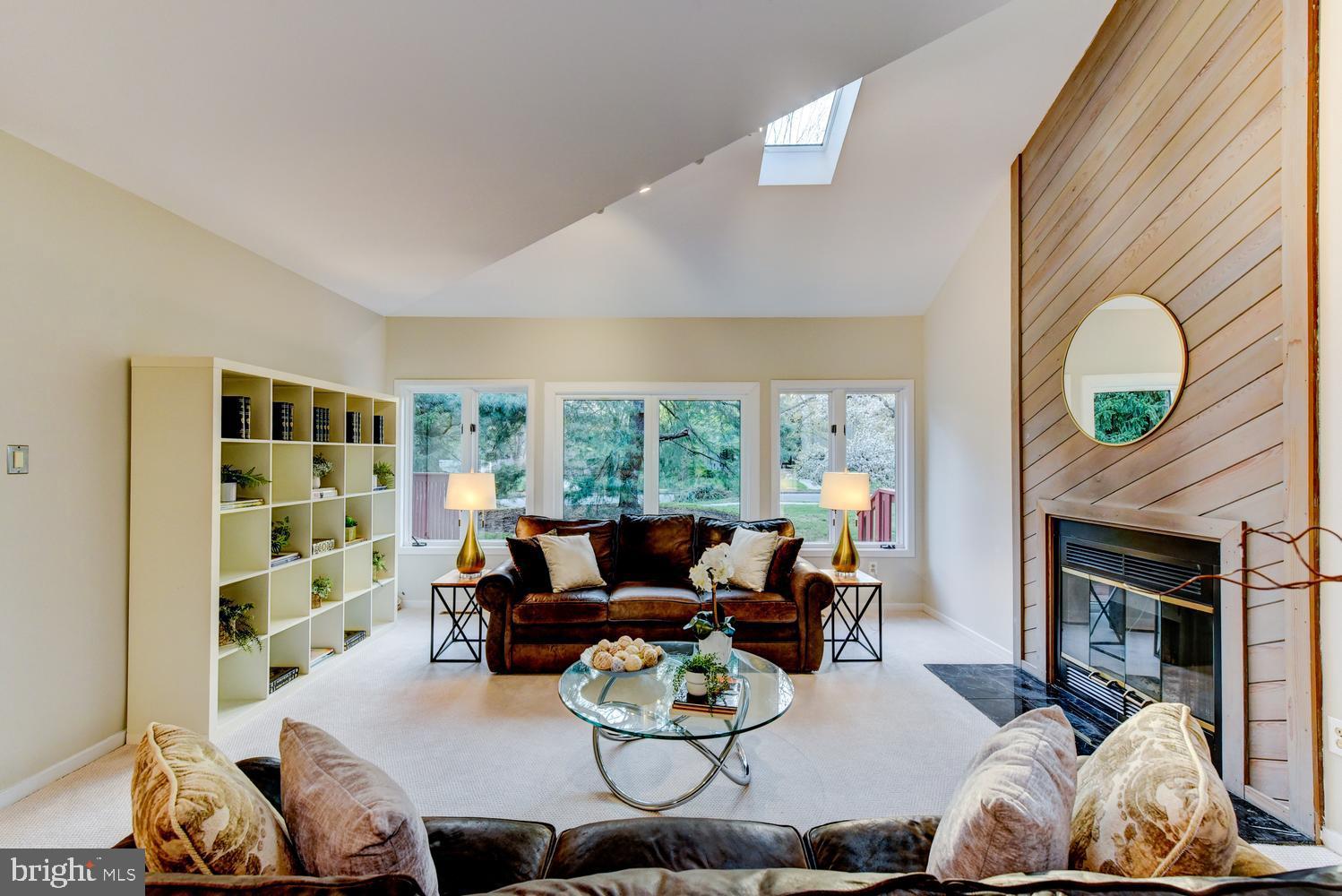 15 Hawk Drive Princeton Junction, NJ 08550 - Photo 40 of 95 a living room with furniture fireplace and a large window