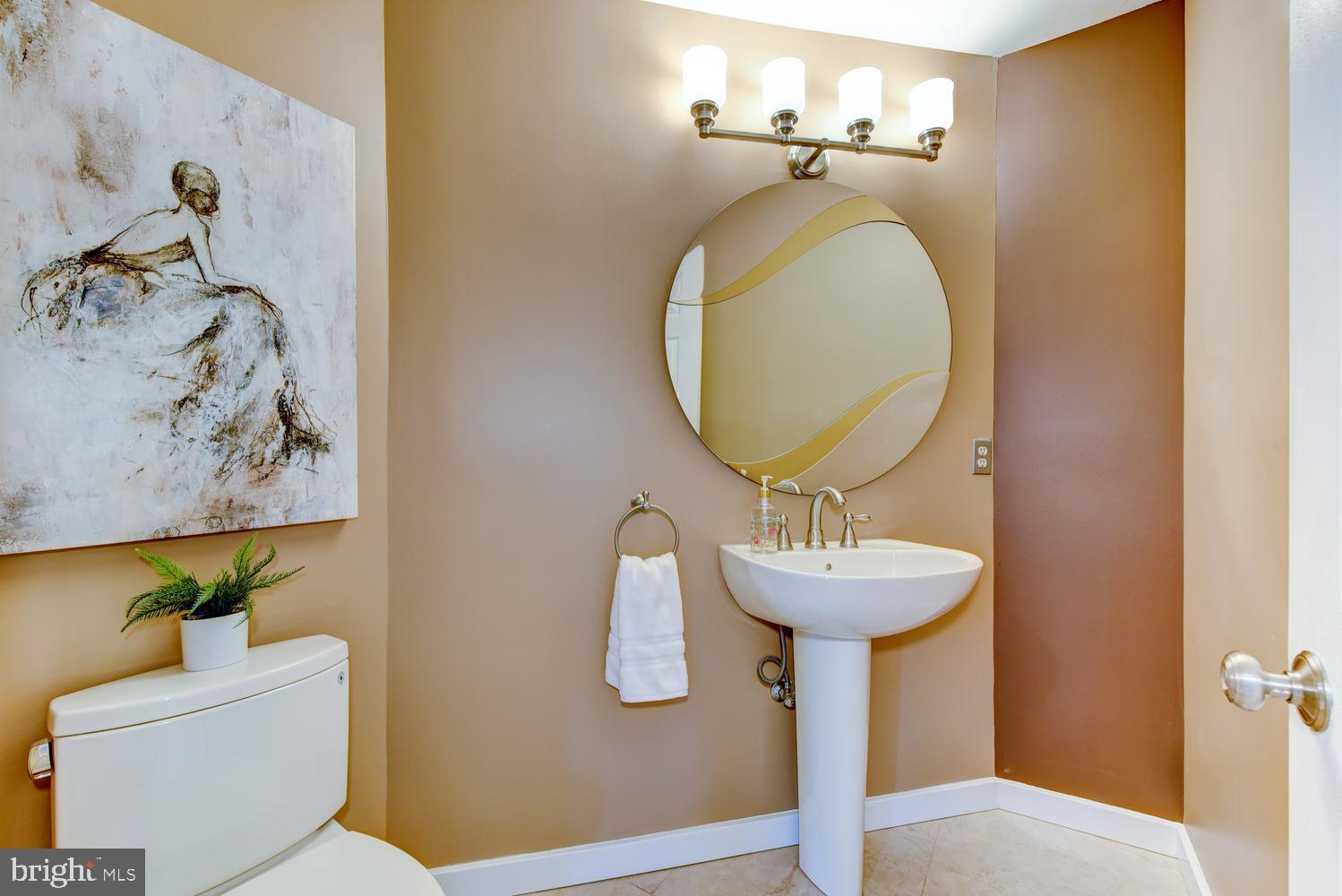 15 Hawk Drive Princeton Junction, NJ 08550 - Photo 44 of 95 a bathroom with a sink mirror and toilet