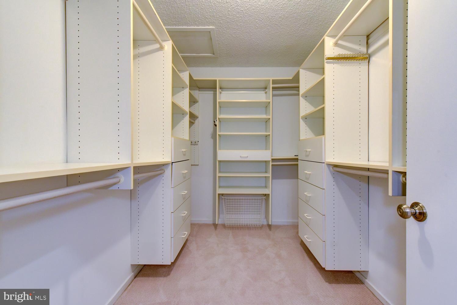 15 Hawk Drive Princeton Junction, NJ 08550 - Photo 52 of 95 a view of walk in closet with empty racks