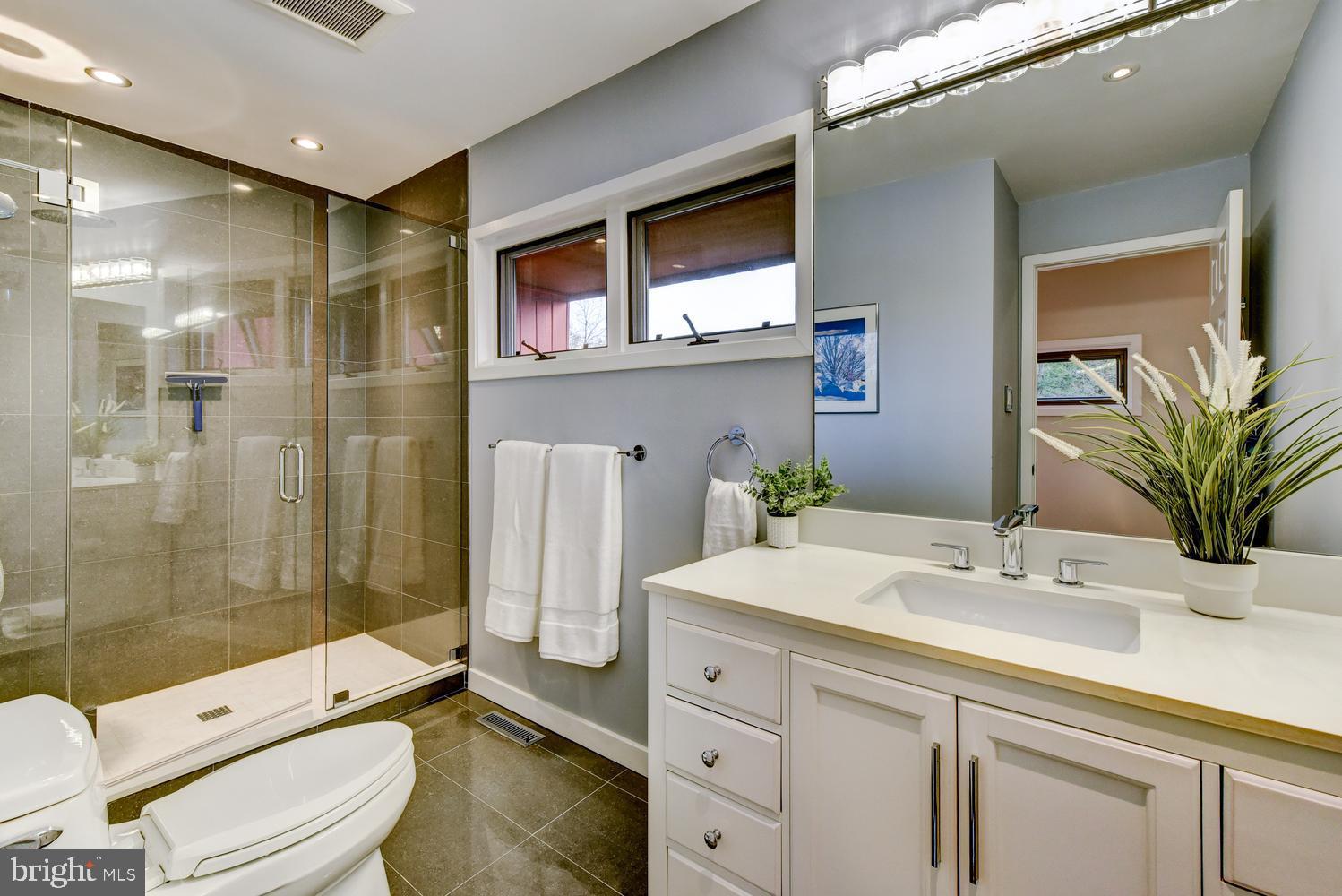 15 Hawk Drive Princeton Junction, NJ 08550 - Photo 54 of 95 a bathroom with a sink a toilet and shower