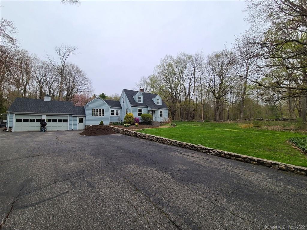 194 Smith Hill Road Winchester, CT 06098 - Photo 1 of 1 a view of a house with a big yard and large trees