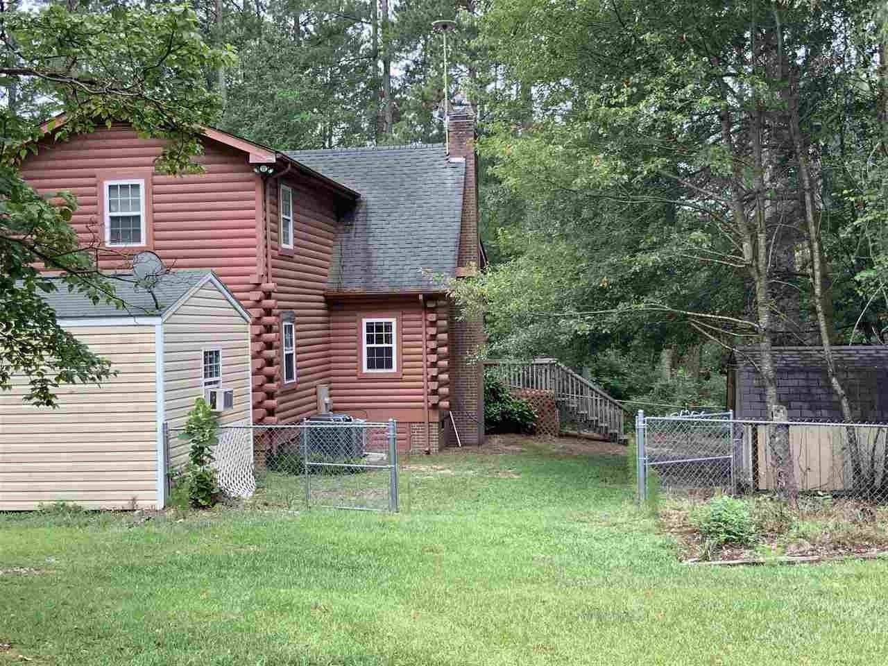 Side yard w/storage buildings