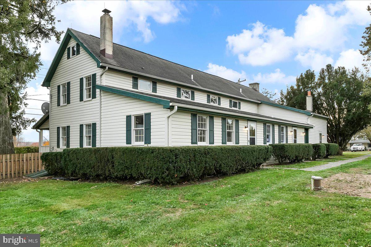 355 Gum Tree Road Coatesville, PA 19320 - Photo 2 of 24 a front view of a house with a yard