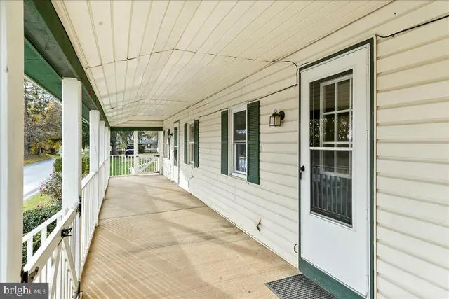 a view of house with large windows