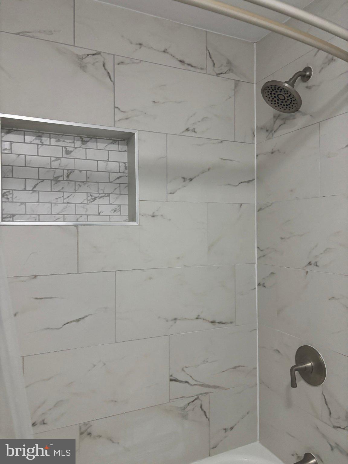 14800 Rydell Road, Unit 201 Centreville, VA 20121 - Photo 22 of 28 Elegant marble shower retreat.