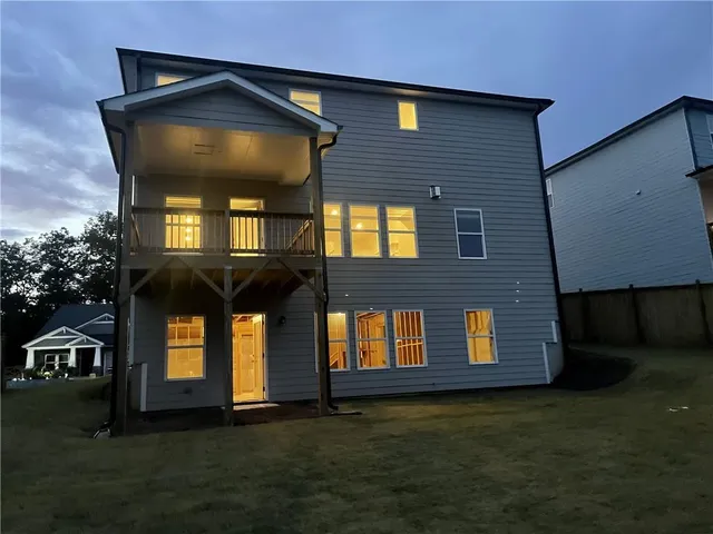 a front view of a house having yard