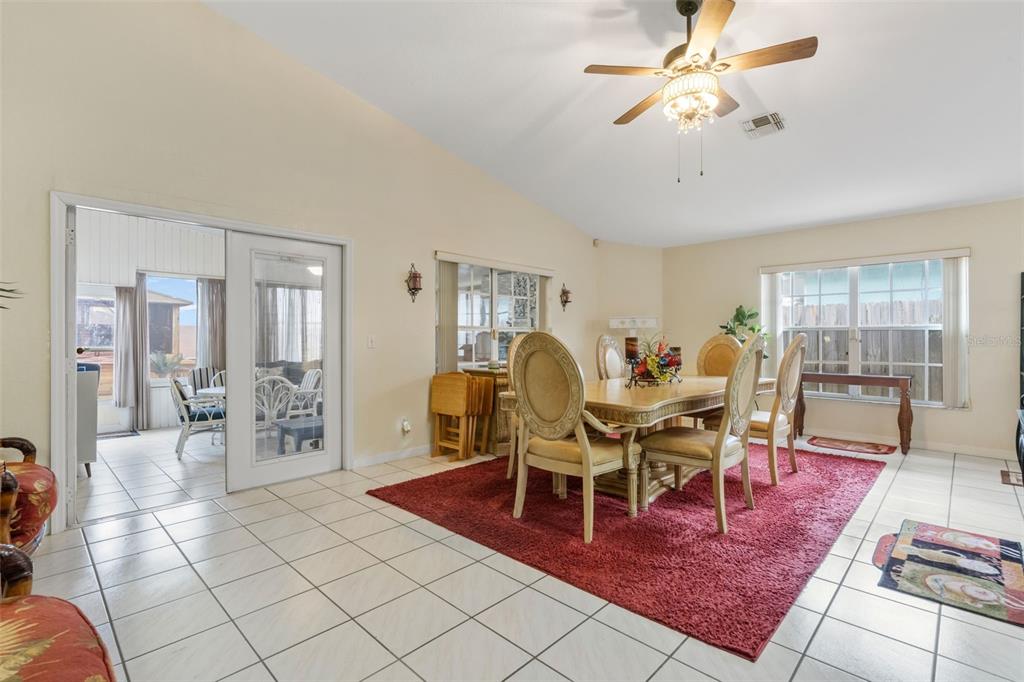 511 Marcia Loop Winter Haven, FL 33884 - Photo 11 of 46 a view of a dining room with furniture