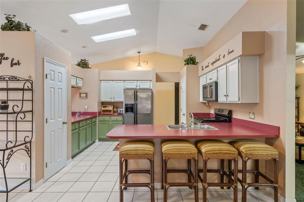511 Marcia Loop Winter Haven, FL 33884 - Photo 12 of 46 a view of a dining room with furniture