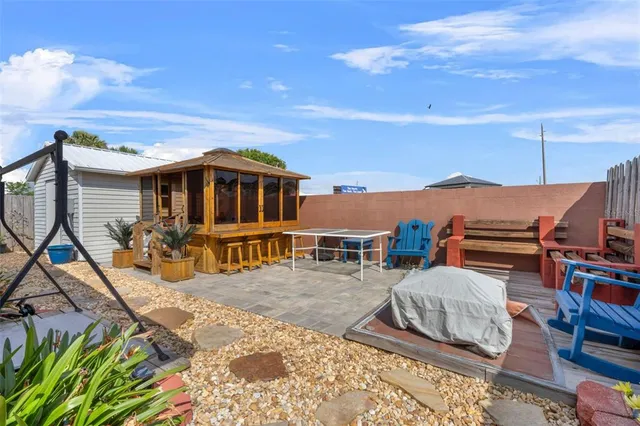 a view of a house with roof deck