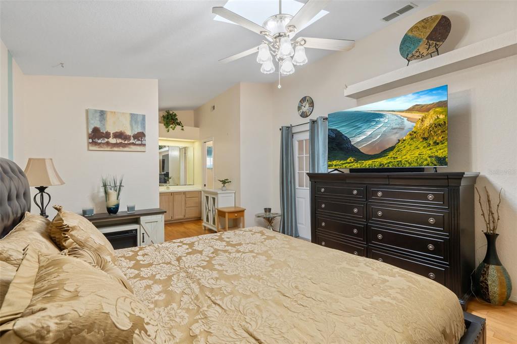 511 Marcia Loop Winter Haven, FL 33884 - Photo 21 of 46 a bedroom with a bed and furniture