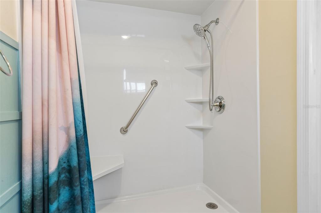 511 Marcia Loop Winter Haven, FL 33884 - Photo 23 of 46 a bathroom with a shower