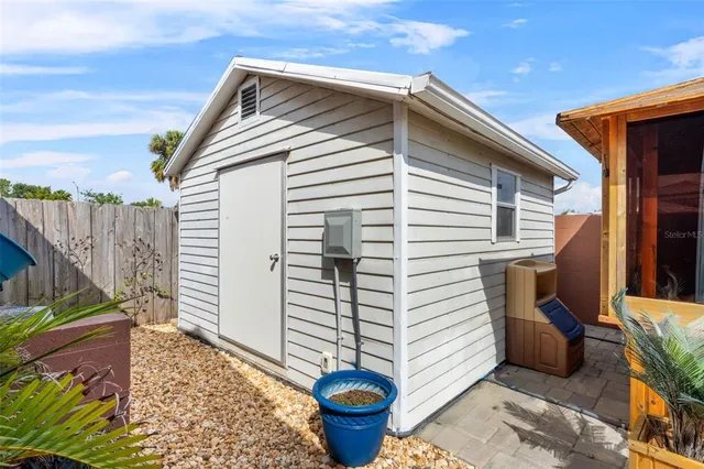 a front view of a house with patio