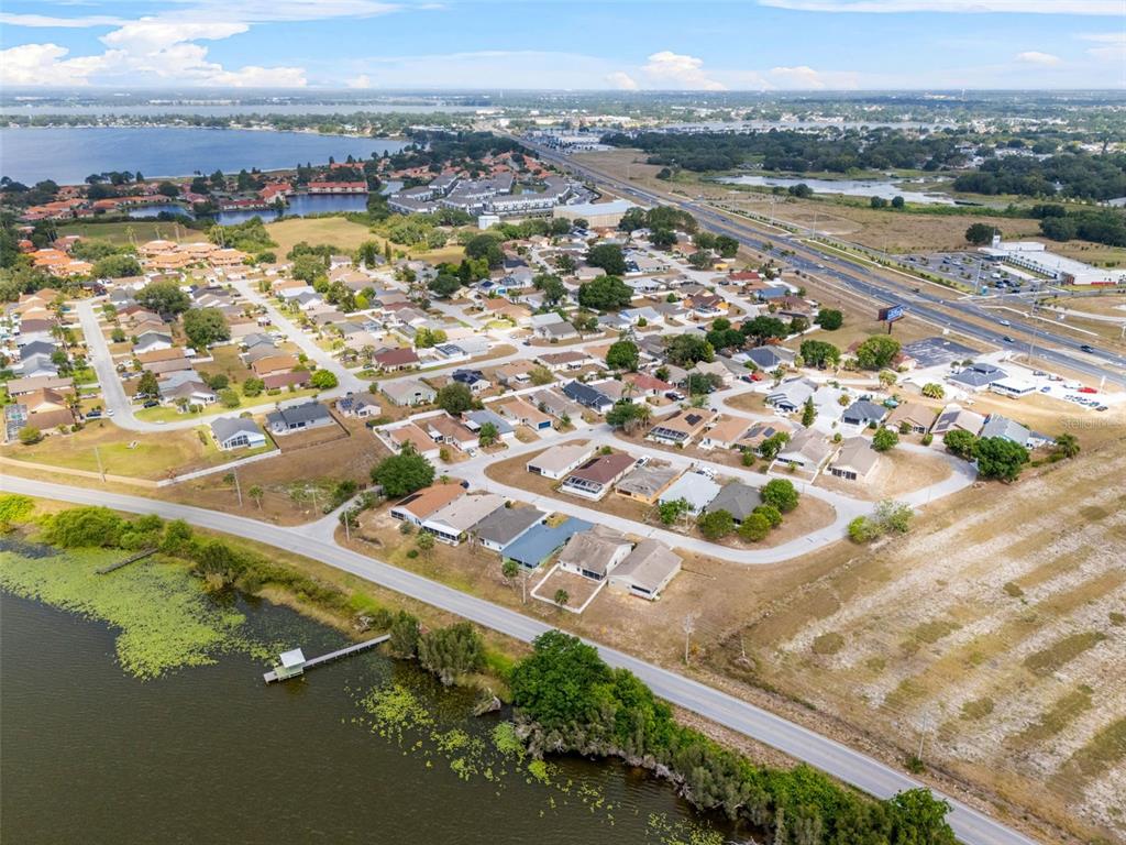 511 Marcia Loop Winter Haven, FL 33884 - Photo 44 of 46 an aerial view of residential building and ocean view