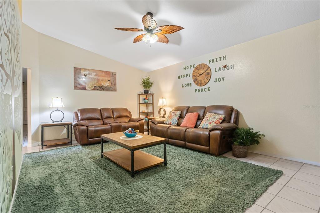 511 Marcia Loop Winter Haven, FL 33884 - Photo 5 of 46 a living room with furniture
