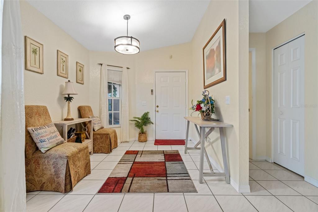 511 Marcia Loop Winter Haven, FL 33884 - Photo 7 of 46 a living room with furniture and a fireplace