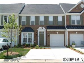 114 Snead Road, Unit 114 Fort Mill, SC 29715 - Photo 1 of 7 a front view of a house with a yard