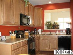 114 Snead Road, Unit 114 Fort Mill, SC 29715 - Photo 2 of 7 a kitchen with a sink and cabinets