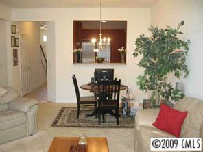 114 Snead Road, Unit 114 Fort Mill, SC 29715 - Photo 3 of 7 a view of a dining room with furniture