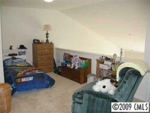 114 Snead Road, Unit 114 Fort Mill, SC 29715 - Photo 6 of 7 a view of living room with furniture and a flat screen tv