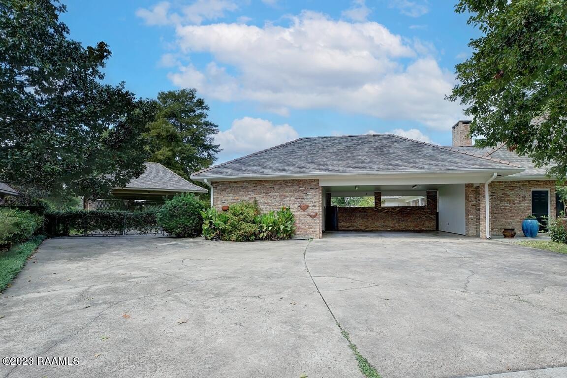 202 Kings Road Lafayette, LA 70503 - Photo 28 of 28 Carport, Workshop and backyard access