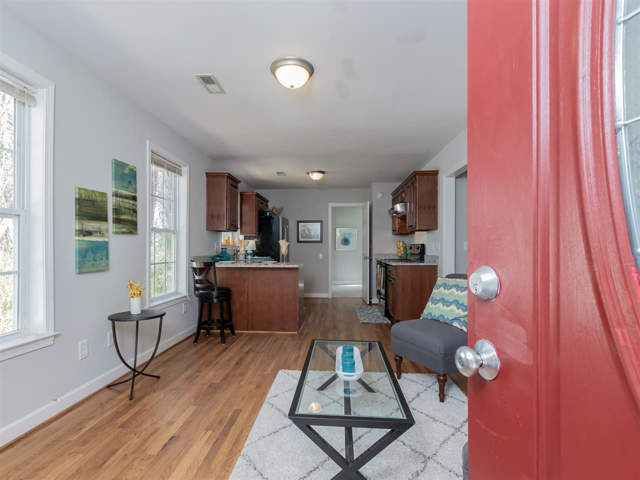 400 Colleton Road Raleigh, NC 27610 - Photo 4 of 23 Gleaming hardwoods and light filled rooms greet you as you enter! Welcome home!