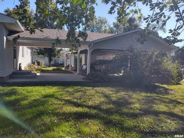 a view of a backyard with garden