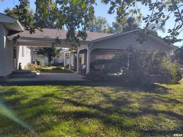 a view of a backyard with garden