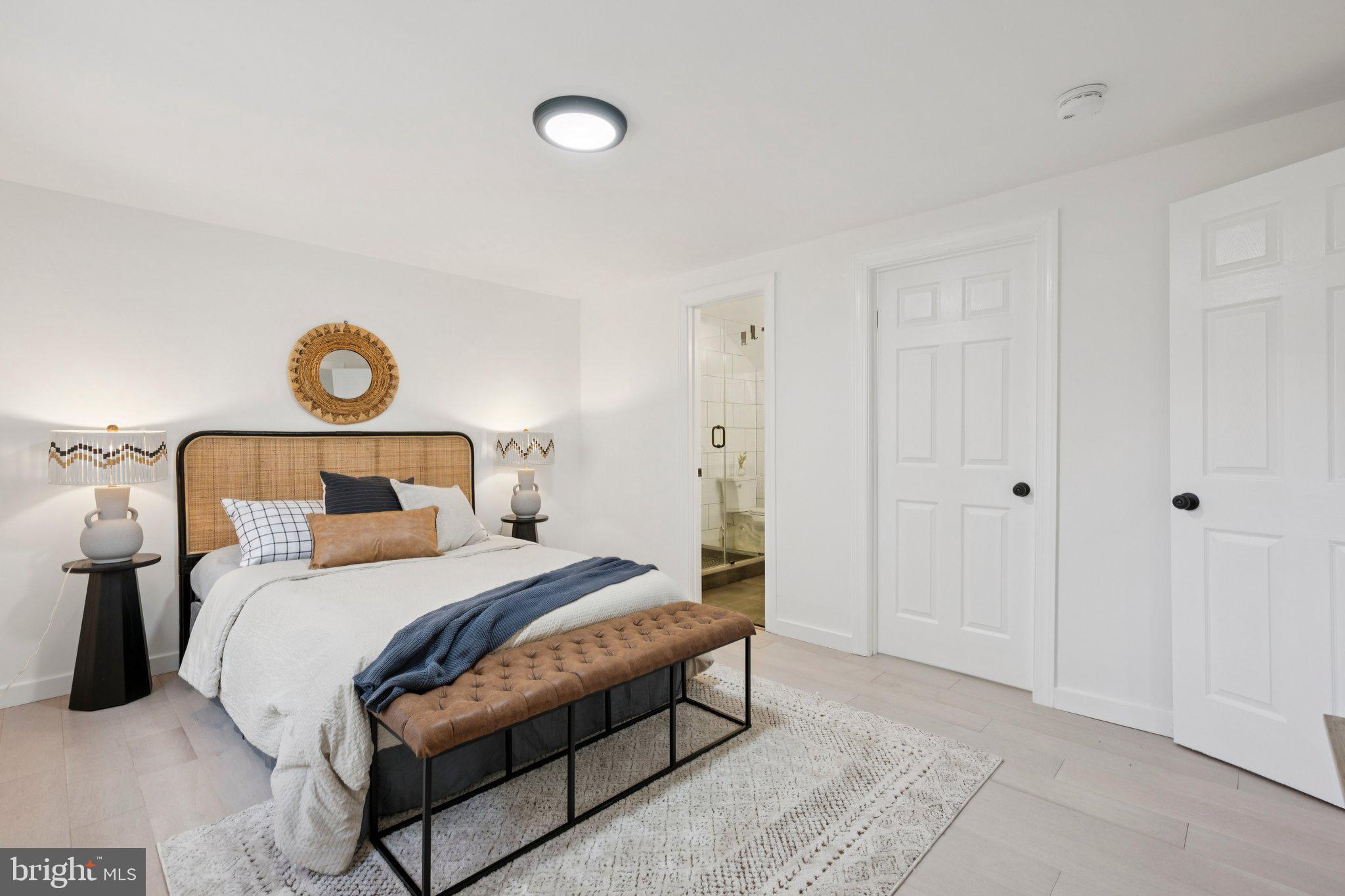 14912 Coles Chance Road North Potomac, MD 20878 - Photo 12 of 36 a bedroom with a bed and a lamp