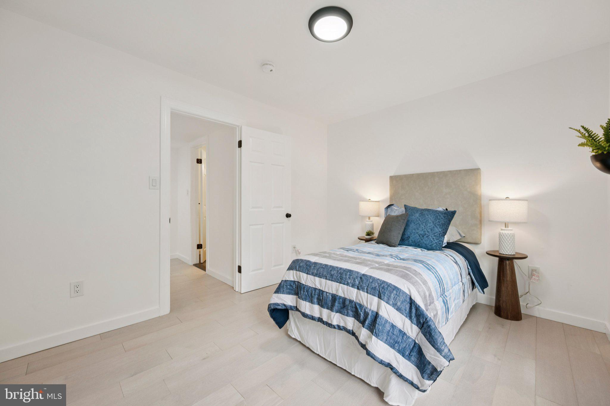 14912 Coles Chance Road North Potomac, MD 20878 - Photo 20 of 36 a bedroom with a bed and a window