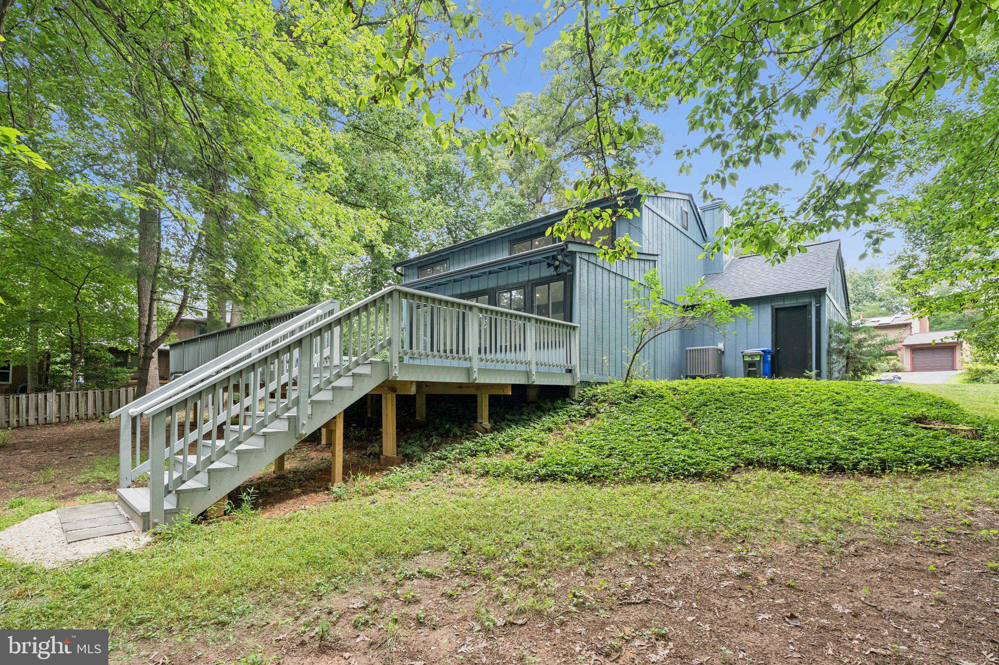 14912 Coles Chance Road North Potomac, MD 20878 - Photo 22 of 36 a view of house with a yard