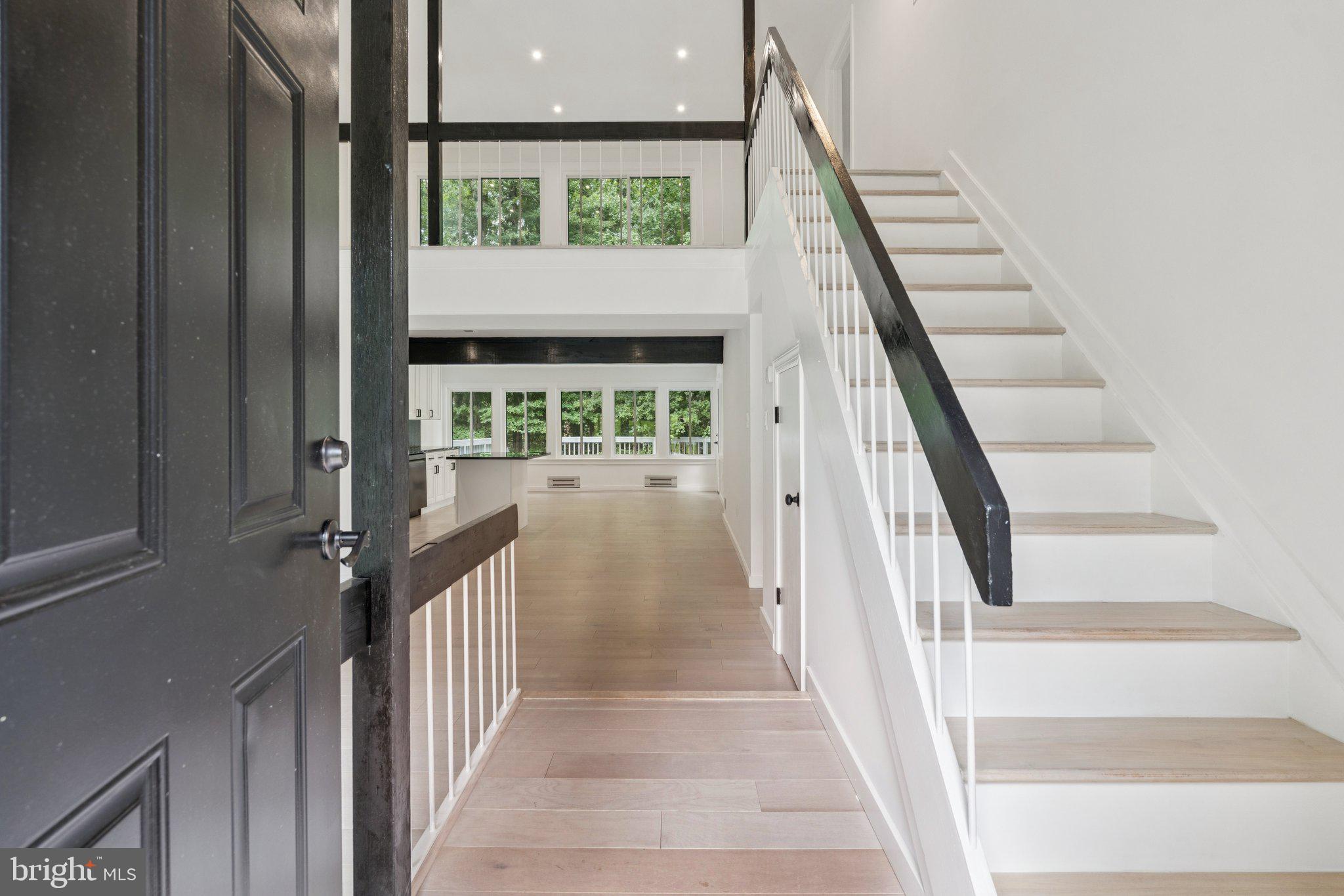 14912 Coles Chance Road North Potomac, MD 20878 - Photo 30 of 36 a view of entryway and hall with wooden floor
