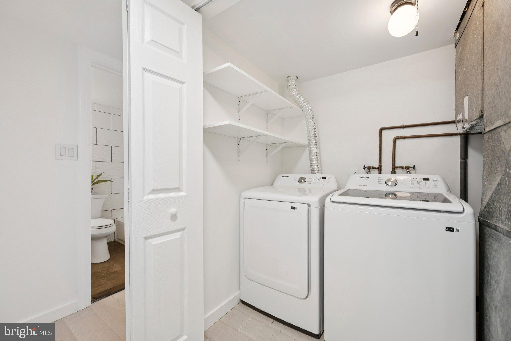 14912 Coles Chance Road North Potomac, MD 20878 - Photo 32 of 36 a utility room with dryer and washer