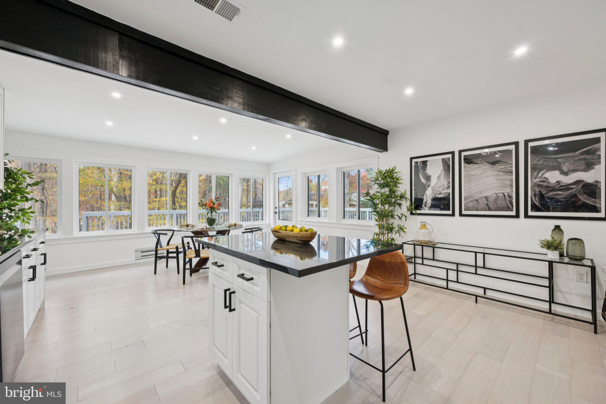 14912 Coles Chance Road North Potomac, MD 20878 - Photo 7 of 36 a living room with furniture and a large window