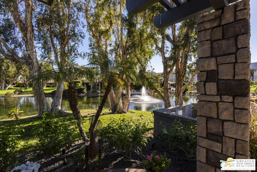 8 Surrey Court Rancho Mirage, CA 92270 - Photo 4 of 48 a view of statue in a garden
