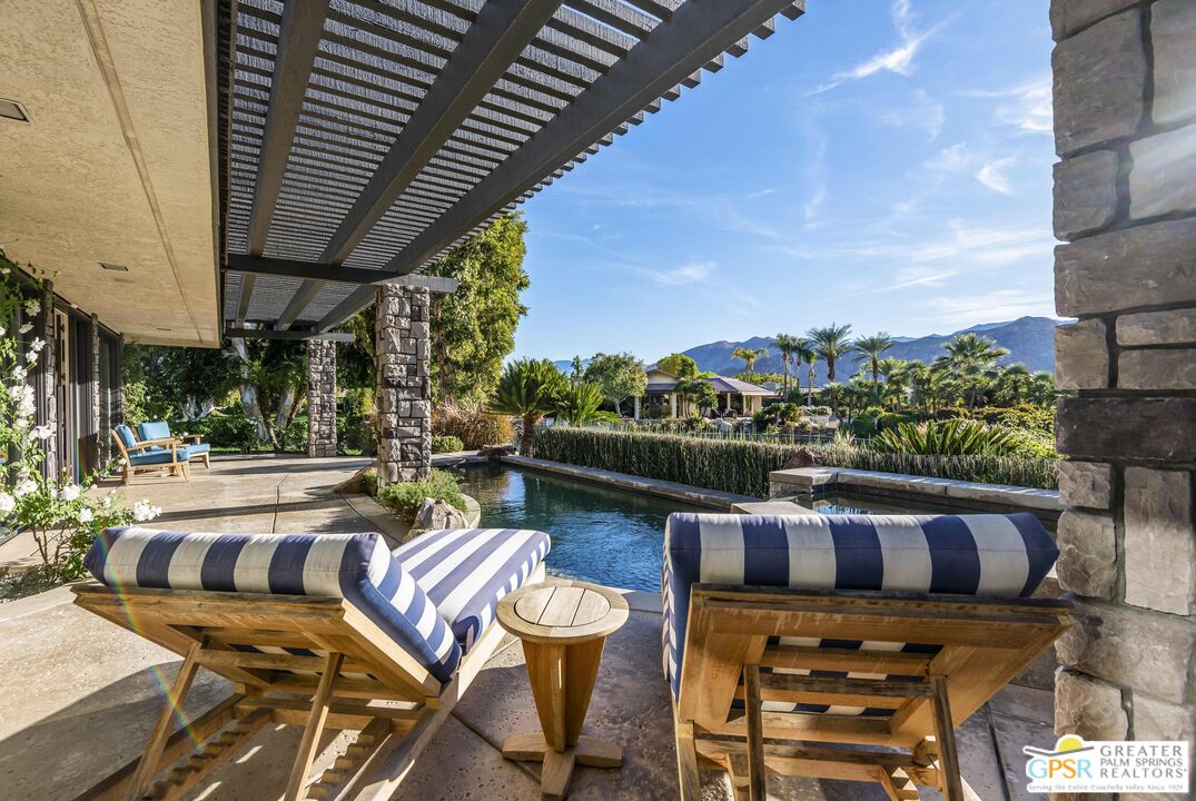 8 Surrey Court Rancho Mirage, CA 92270 - Photo 41 of 48 a view of a chairs and table in patio