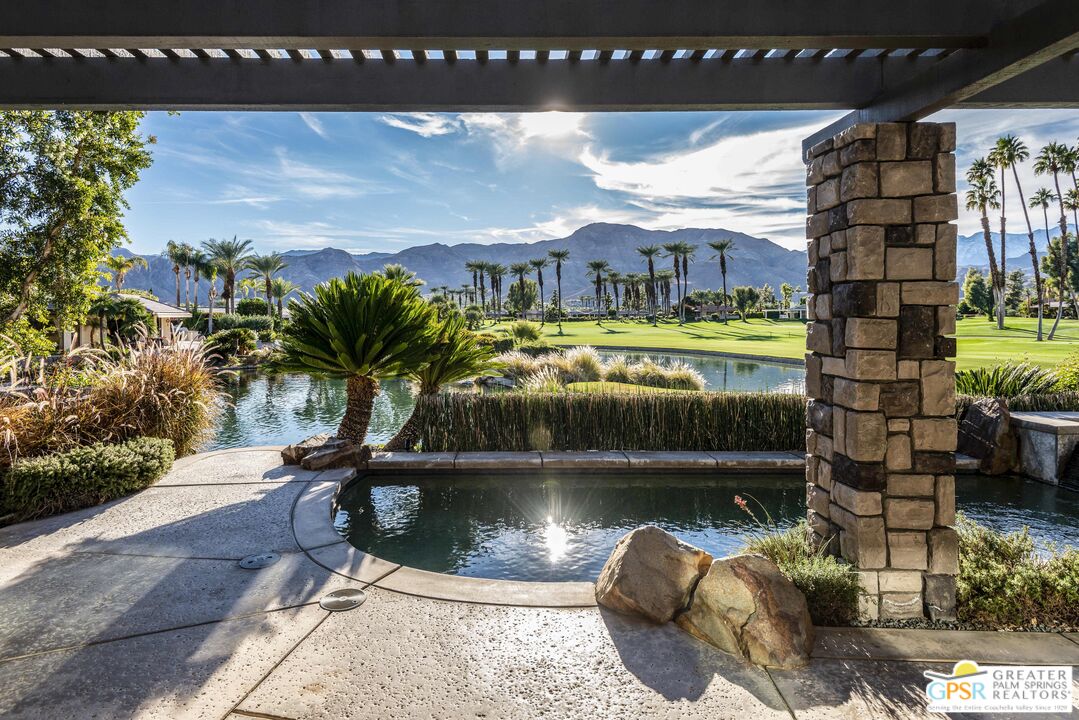 8 Surrey Court Rancho Mirage, CA 92270 - Photo 44 of 48 a view of swimming pool from a balcony
