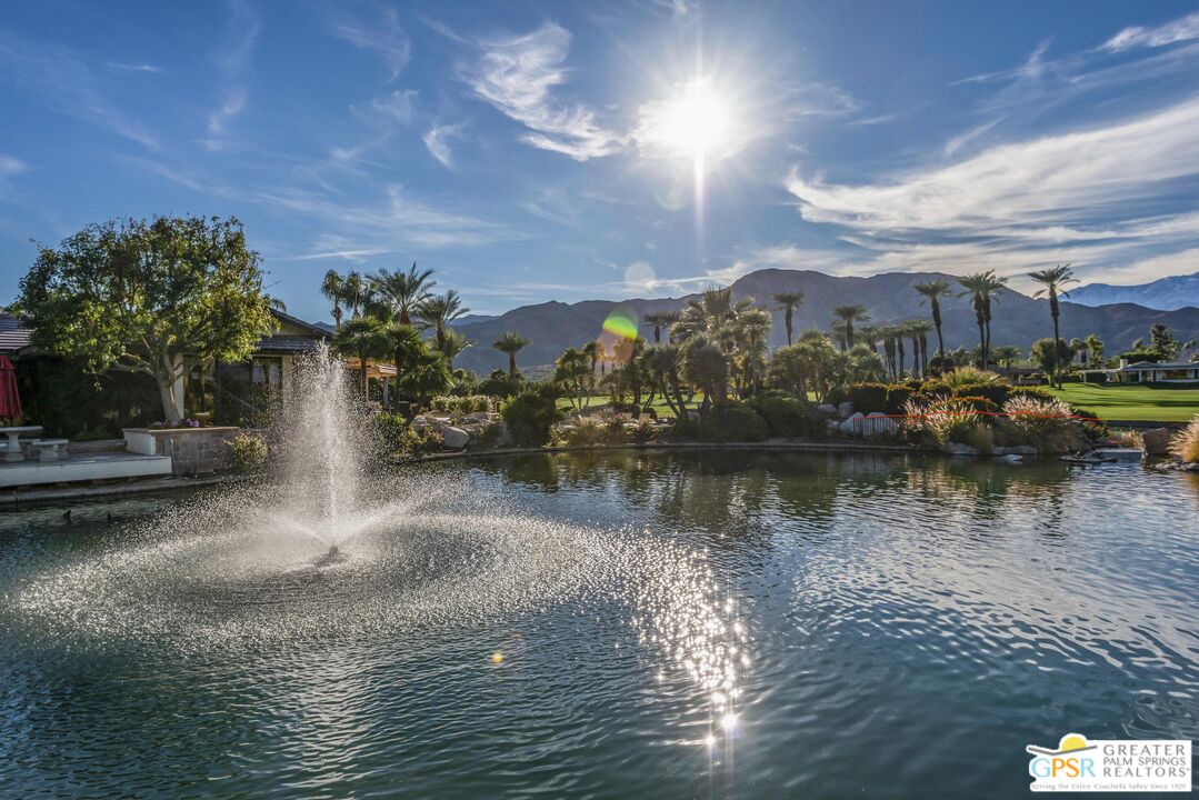 8 Surrey Court Rancho Mirage, CA 92270 - Photo 46 of 48 a view of a lake with houses