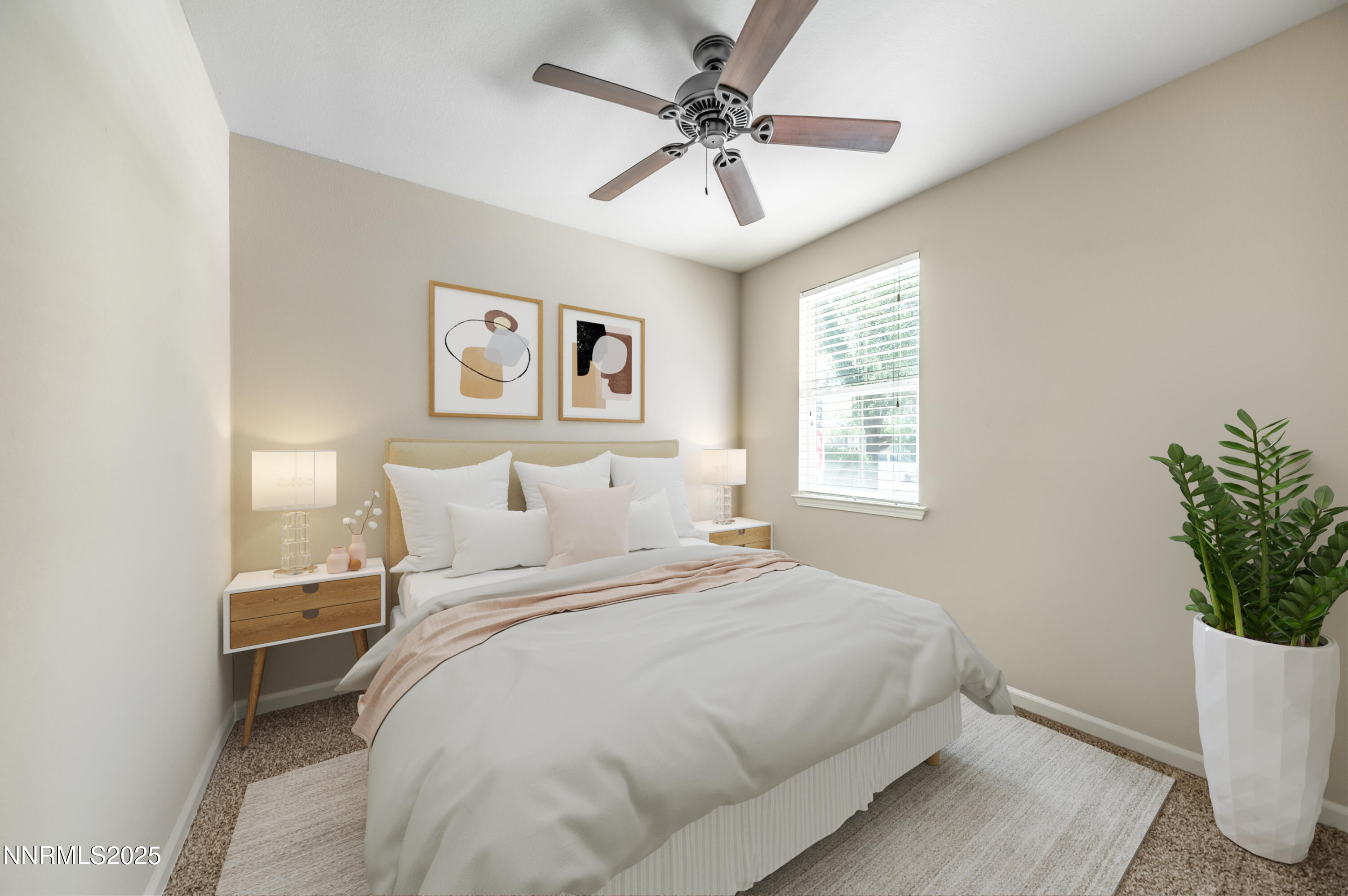 10742 Amber Falls Drive Reno, NV 89521 - Photo 17 of 28 a bedroom with a bed and a potted plant