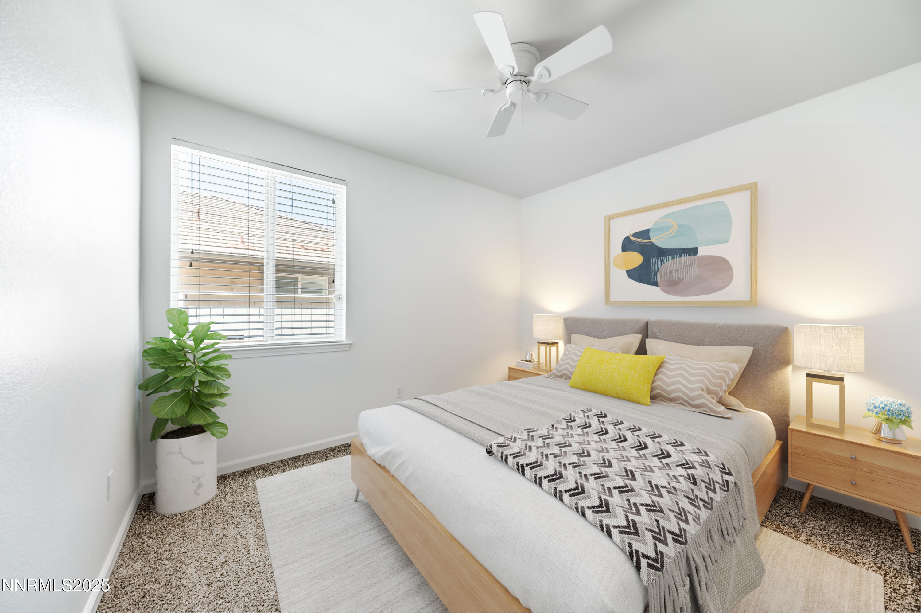 10742 Amber Falls Drive Reno, NV 89521 - Photo 21 of 28 a bedroom with a bed and a potted plant
