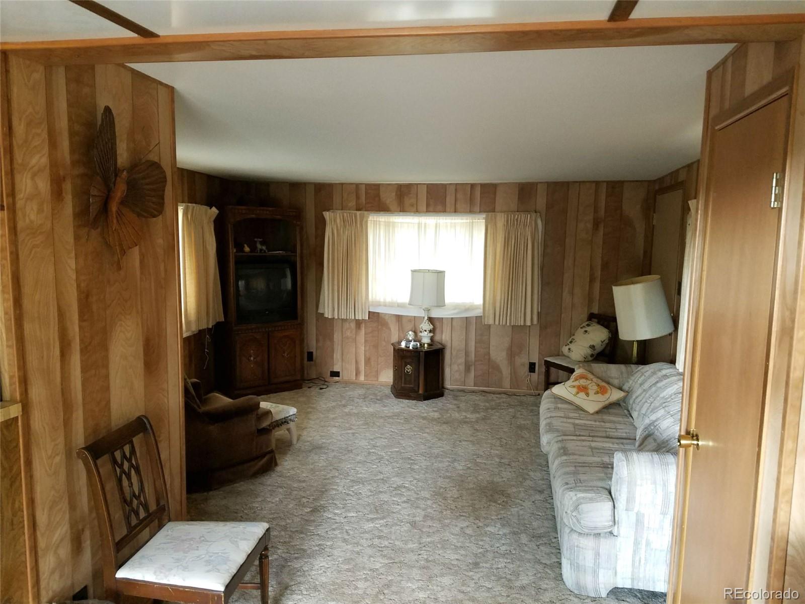 165 Baker Road Bailey, CO 80421 - Photo 6 of 20 a room with furniture and a window