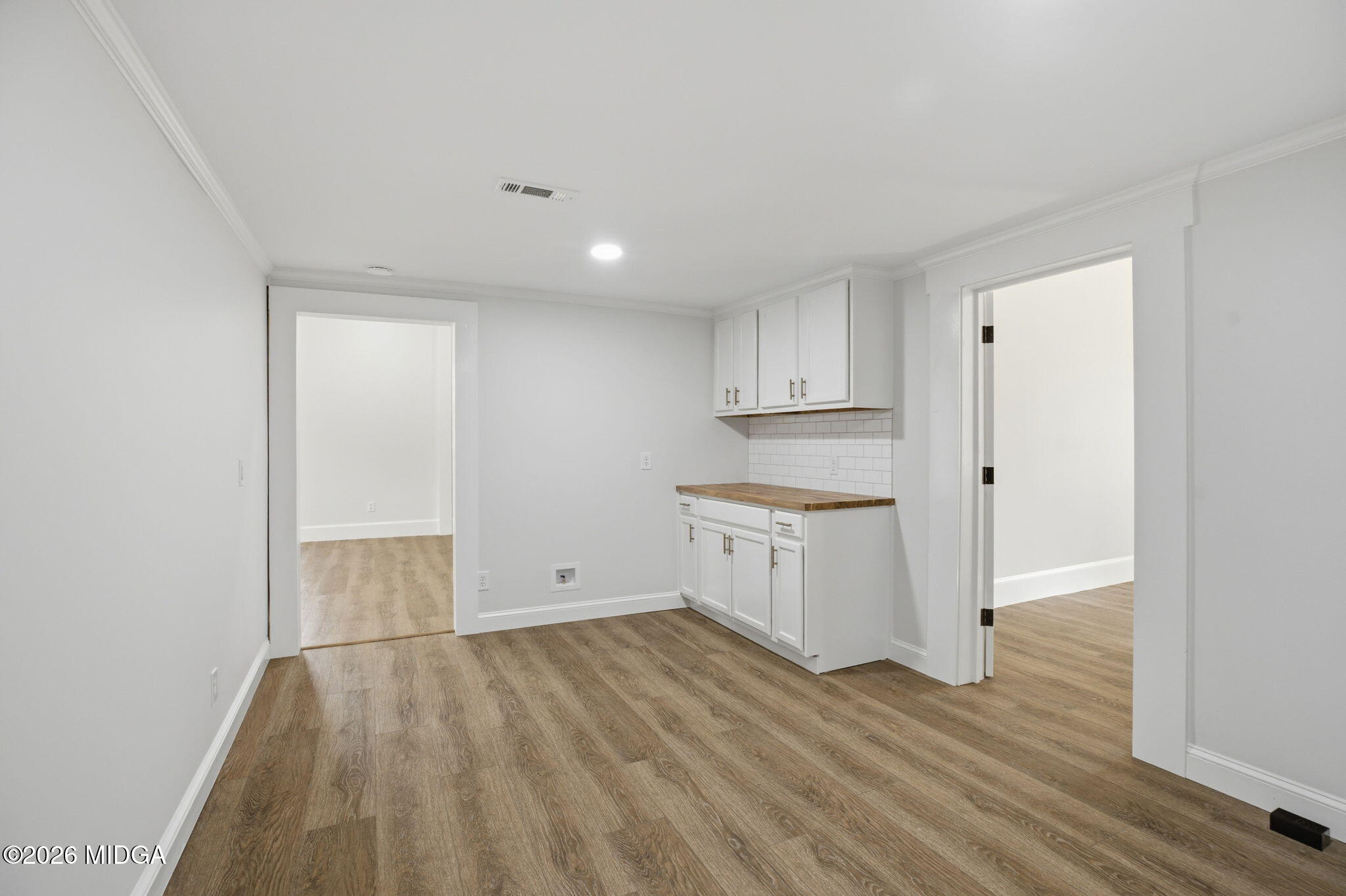 3181 Dames Ferry Road Forsyth, GA 31029 - Photo 20 of 36 a view of a kitchen with wooden floor